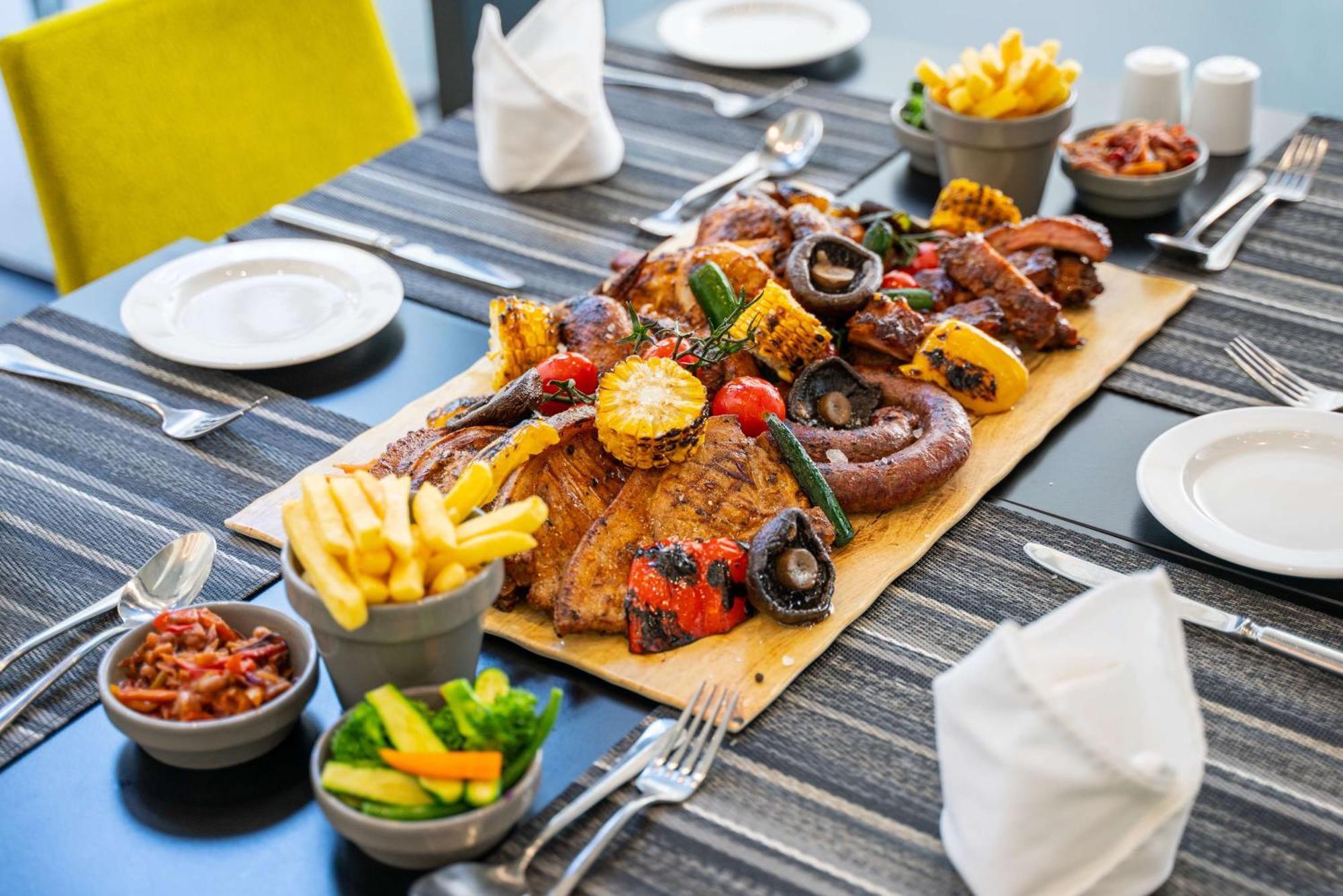 Hilton Garden Inn מבאבאנה מראה חיצוני תמונה